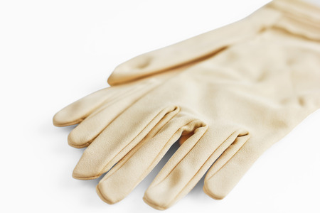Light gloves over white  Winter glovesの写真素材