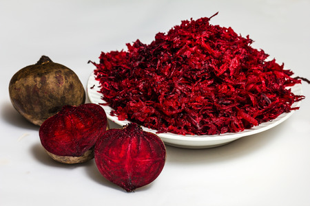 Beet and beet salad isolated on white backgroundの写真素材