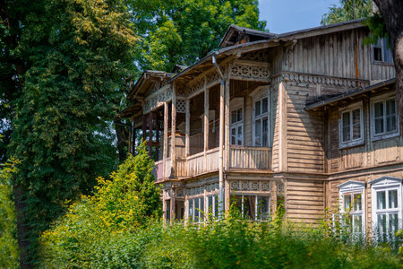 Old wooden house in the woodsの写真素材