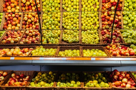 Fresh red and green apple fruits in a supermarket. Different kind of applesの写真素材