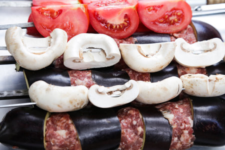 Eggplant kebab to barbecue. shish kebab cooked over coal fireの写真素材