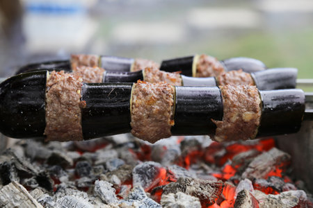 Eggplant kebab to barbecue. shish kebab cooked over coal fireの写真素材