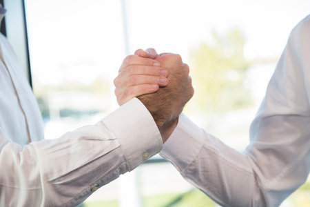 two business men shaking hands