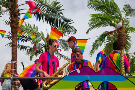 BRIGHTON, UK - AUG 03 2019: Revellers enjoying the 2019 Brighton Pride Festival