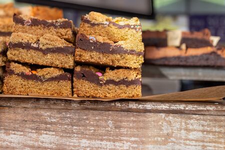 Chocolate fudge bars on sale at a food market stall in the UKの写真素材