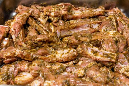 Raw pork ribs marinated in jamaican jerk seasoningの写真素材