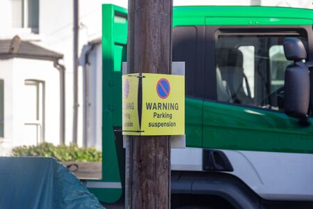 Parking suspension warning sign board on a residential London streetの写真素材
