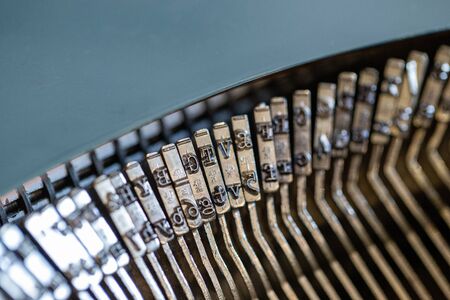 Close up of old fashioned vintage typewriter typebarsの写真素材