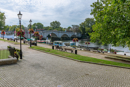 Richmond upon Thames, Surrey, England - September 02 2020: Scenic view of Richmond waterfront with River Thames and Richmond Bridge in the backgroundのeditorial素材