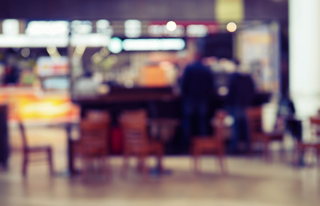 blurred view of the cafe with peopleの写真素材