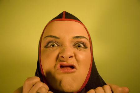 Young Agression Woman In Mask. Yellow Series.の写真素材