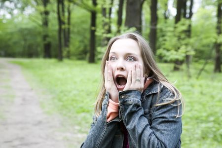 Portrait of a shocked young womanの写真素材