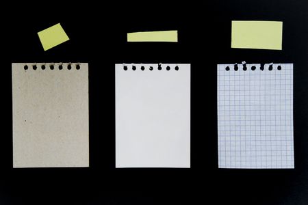 Sheets of notepad and tape.