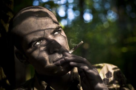 Smoke Concept. Men Smoking Outdoors.の写真素材