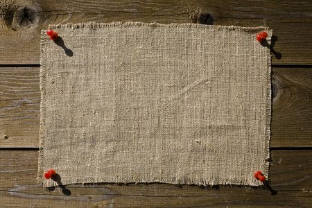 Textile Patch On Dark Wooden Texture