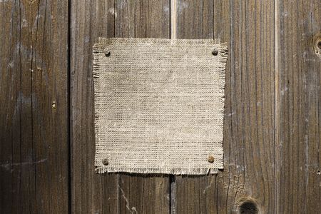 Canvas On Dark Wooden Texture. Ready For Your message.の写真素材