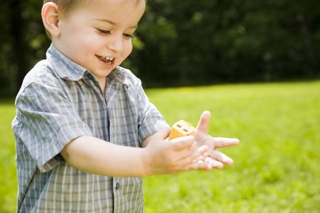 Happy Childhood.  Boy Playing Outdoors.の写真素材
