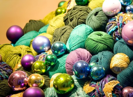 Christmas Decoration. Colorful Thread And Glass Balls Under The Light.