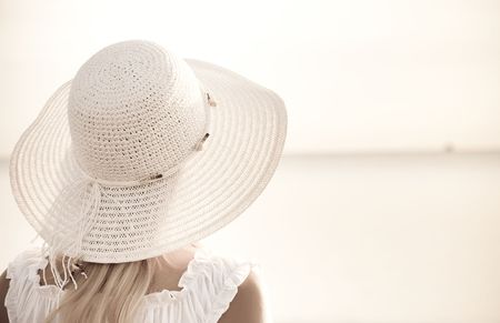 Girl in a white hat. Travel collection.の写真素材
