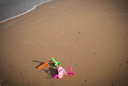 Seafront and colorful plastic toys. Childhood collection.の写真素材
