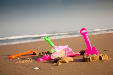 Kids toys on the beach. Childhood collection.の写真素材