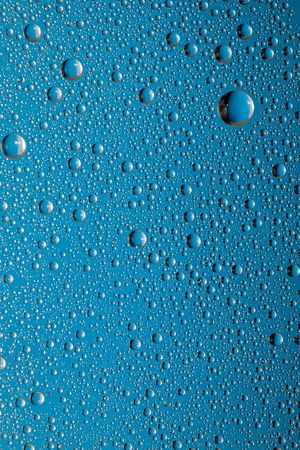 Water drops on a glass surface. Nature collection.の写真素材