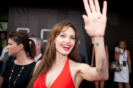 MOSCOW - JULY 25: Actress Angelina Jolie at the premiere of the movie "Salt" at the "October" Cinema. July 25, 2010 in Moscow, Russia.のeditorial素材