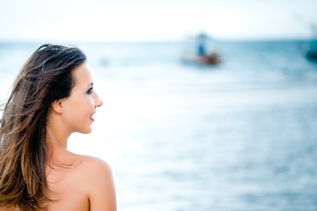 Pretty Woman Portrait On The Sea Backgroundの写真素材