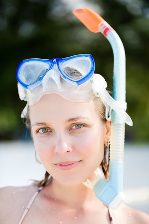Portrait of snorkeling young adult womanの写真素材