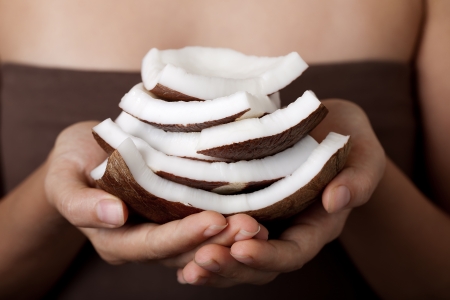 Coconut on hands. SPA collection.の写真素材