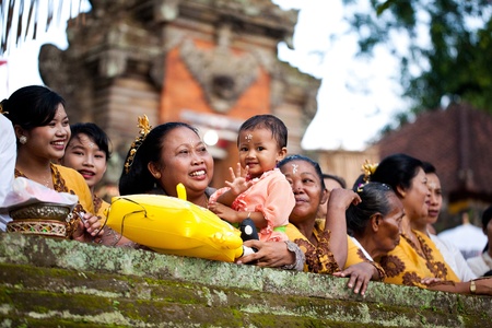 GIANYAR, BALI, INDONESIA- MAY 21: An unidentified Balineses dressed in traditional costume during the Odalan Festival on May 21, 2011 in Gianyar, Bali, Indonesia.のeditorial素材
