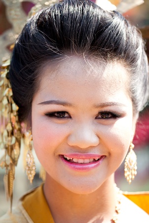 CHIANG MAI, THAILAND - FEBRUARY 4: Young woman portrait in procession on Chiang Mai 36th Flower Festival on February 4, 2012 in Chiang Mai, Thailandのeditorial素材