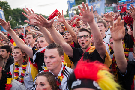 BERLIN - JUNE, 22: Unknown german fans celebrating football game on Euro 2012 near Brandenburger Tor. June 22, 2012 in Berlin, Germanyのeditorial素材