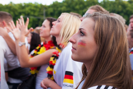 BERLIN - JUNE, 22: Unknown german fans celebrating football game on Euro 2012 near Brandenburger Tor. June 22, 2012 in Berlin, Germanyのeditorial素材