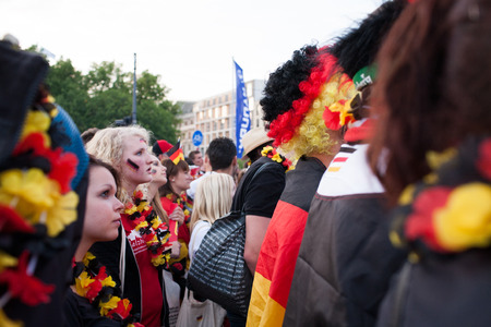 BERLIN - JUNE, 22: Unknown german fans celebrating football game on Euro 2012 near Brandenburger Tor. June 22, 2012 in Berlin, Germanyのeditorial素材