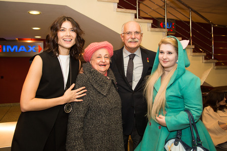 MOSCOW - OCTOBER, 7: Nikita Mikhalkov, Actress Marina Solovyeva. Premiere of the movie Solnechny Udar, October, 7, 2014 at Octyabr Cinema in Moscow, Russiaのeditorial素材
