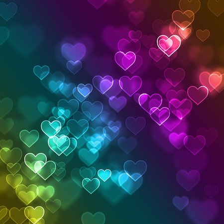Colorful defocused bokeh background with love heart signsの写真素材