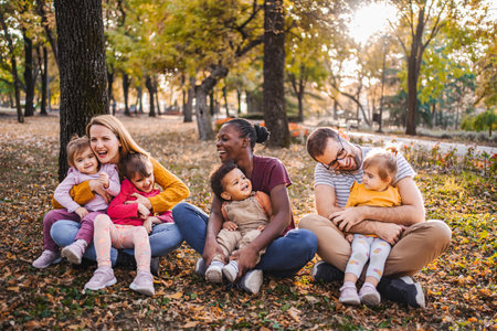 Autumn Embrace: A Tapestry of Family Loveの写真素材