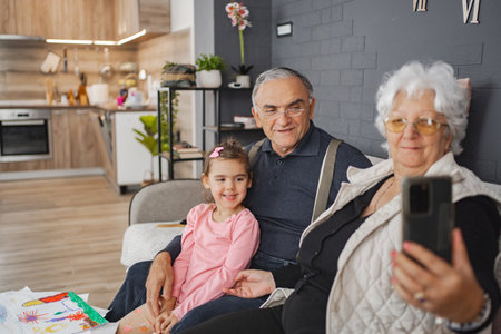 Grandparents sharing joy with their granddaughter