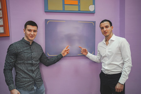 Two male student in classroom
