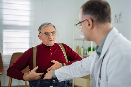 Elderly man receives medical check-up in a bright clinic