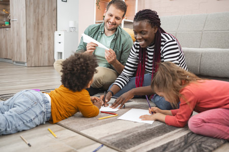 Multiracial family enjoys creative afternoon at home