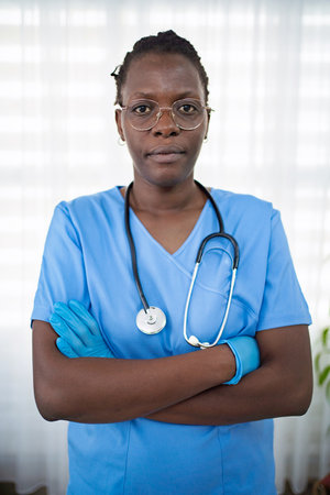 Confident medical pro in blue scrubsの写真素材