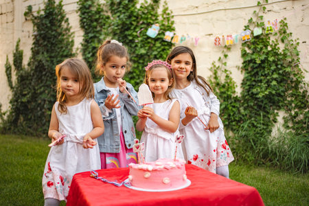 Celebration of friendship at a joyful birthday gatheringの写真素材