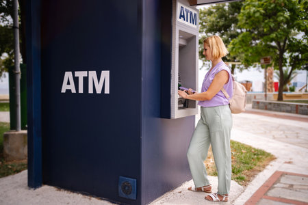 Exploring Greeces summer charm at a local ATMの写真素材