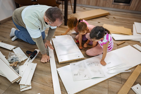 Building creativity together: Grandfather and granddaughters at play
