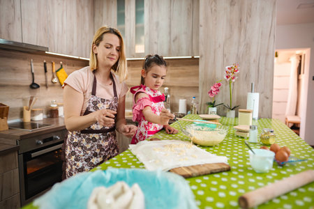 Baking memories in a cozy kitchen with a joyful child