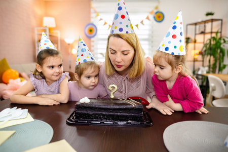 Birthday celebration brings joy to children at a cozy home party