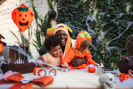 Happy family enjoying Halloween party