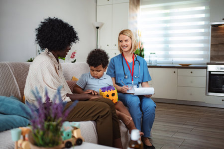 Doctor comforting young child patientの写真素材